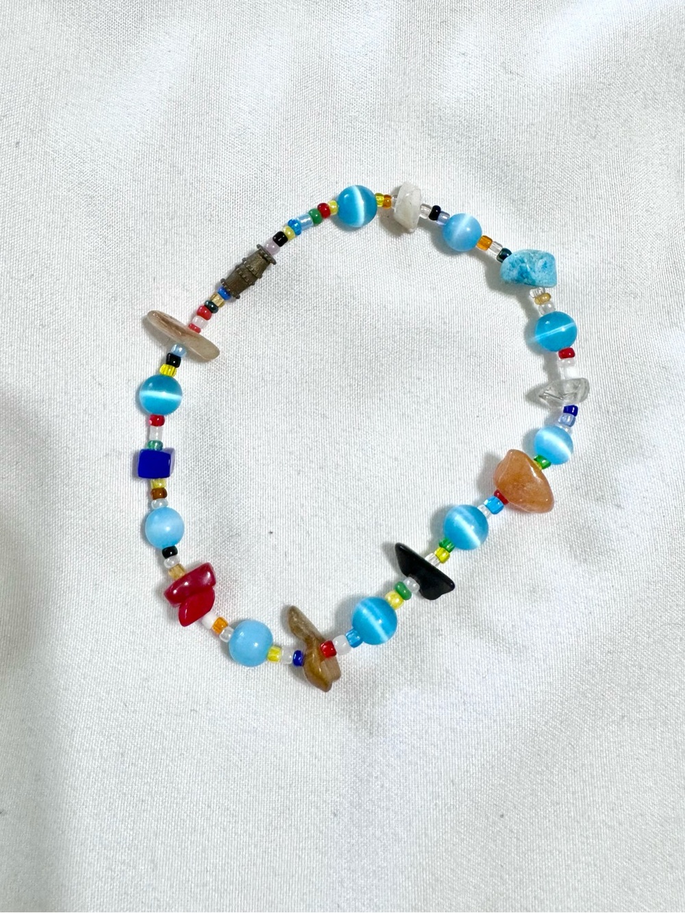 3/$10 Handmade Multicolor Beaded Bracelet with Blue Cat’s Eye